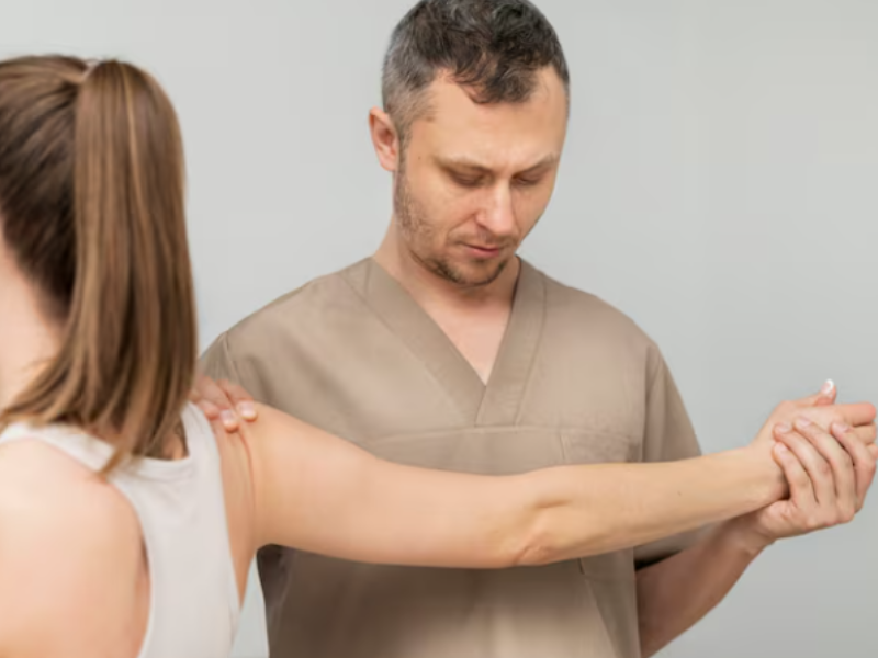 Person with psoriatic arthritis experiencing joint pain and psoriasis symptoms affecting skin and mobility